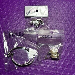 3 pairs Lucky Brand Silver earrings.